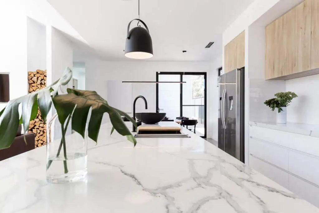 White and wood aesthetic kitchen with black accents